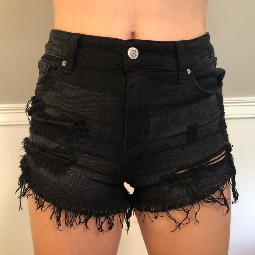 Ripped black shorts